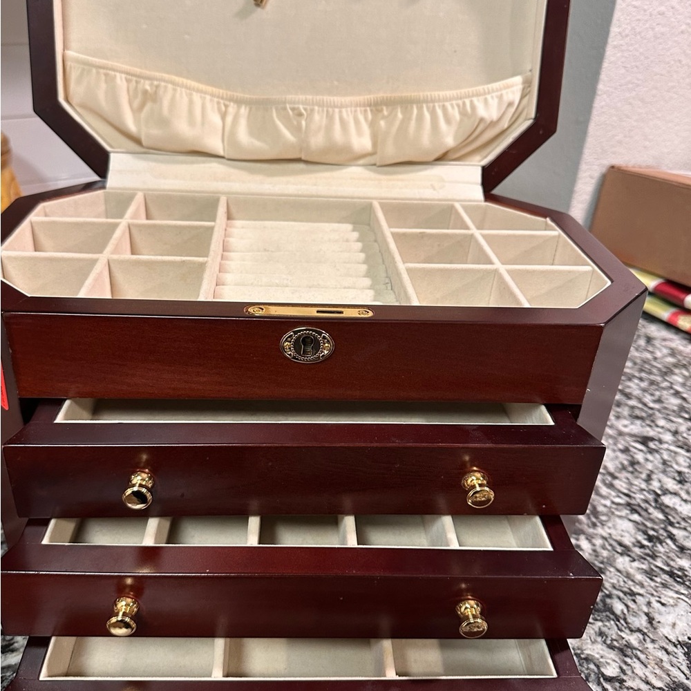 Elegant Brown Jewelry Box with Gold Accents